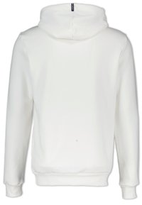 Felpa bianca con tasca a marsupio, polsini e orlo a coste. Materiale in cotone, con etichetta logo cucita sul retro del cappuccio.