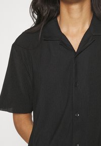 YOURTURN Camicia - black