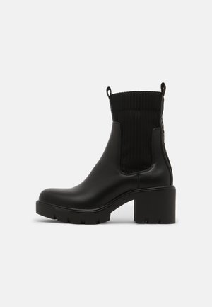Platform ankle boots - black
