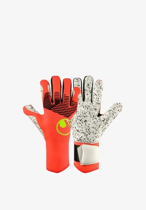 Gants de gardien de but orange vif avec des rayures noires à l'arrière et une prise blanche mouchetée sur les paumes, avec des sangles au poignet.