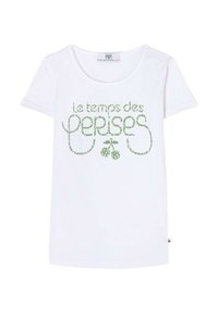 T-shirt en coton blanc avec un texte vert qui dit "le temps des cerises" accompagné de graphismes de cerises. Manches courtes et col rond.