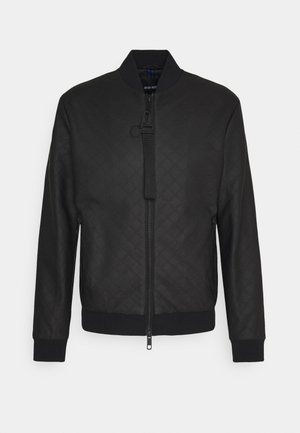 COAT WITH EMBOSSED GEOMETRIC PATTERN - Giacca in similpelle - nero