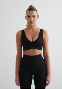 Medium support sports bra - black