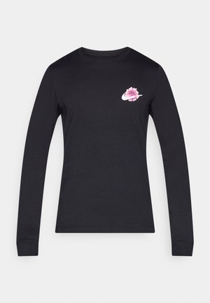 Maglietta nera a maniche lunghe in cotone, con grafica floreale rosa abbinata a un logo bianco sul petto sinistro. Design semplice e aderente.