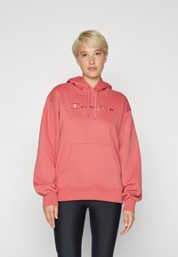 Felpa rosa con cappuccio, tasca frontale e logo ricamato, dal fit casual. Realizzata in tessuto morbido con polsini a costine.