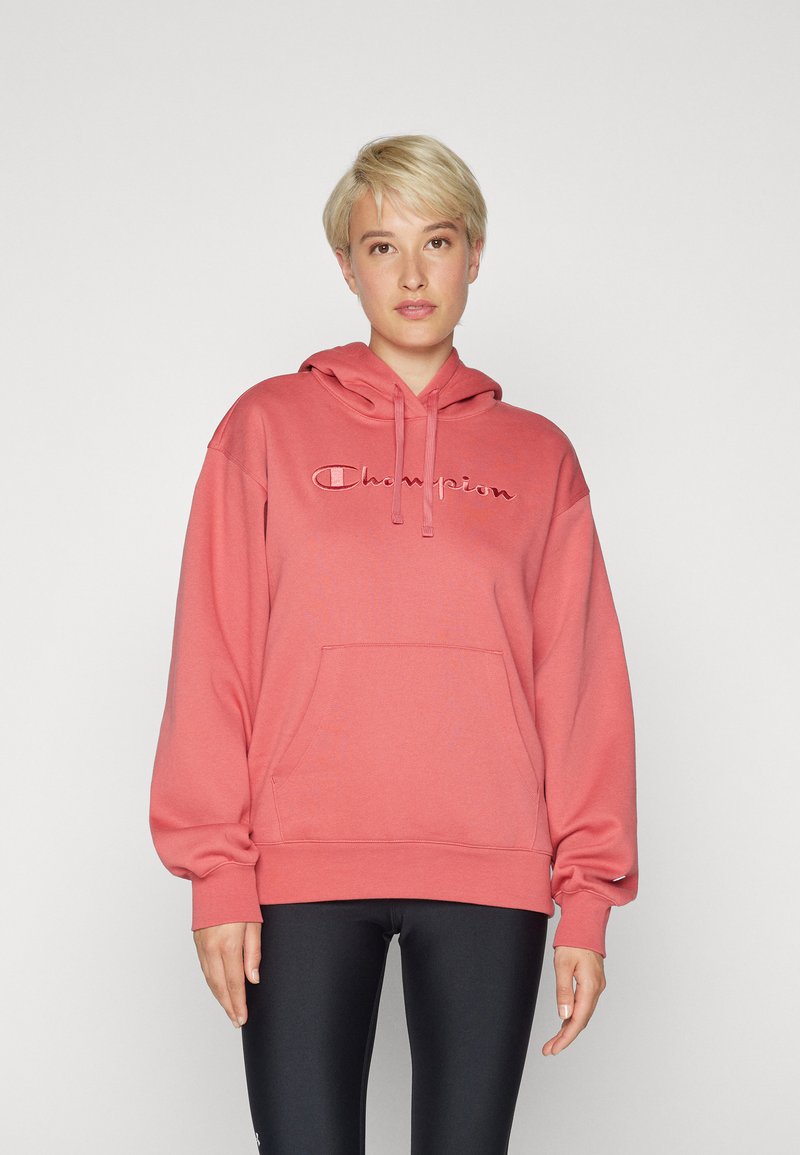 Felpa rosa con cappuccio, tasca frontale e logo ricamato, dal fit casual. Realizzata in tessuto morbido con polsini a costine.