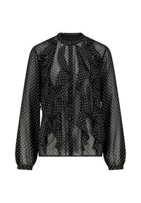 Zwarte sheer blouse met witte stippen, knopen aan de voorkant en ruches langs de borst en mouwen. Lange opgeblazen mouwen.