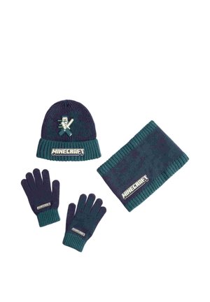 Conjunto de invierno de Minecraft en azul oscuro y verde azulado con gorro de punto con personaje en píxeles, guantes a juego y braga de cuello, cada uno con el logo de Minecraft.