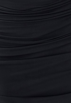 Melna auduma ar savilkšanas tekstūru, ar horizontālām krokām. Gluda, elastīga materiāla ar vienmērīgu krāsojumu, piemērota pieguļošiem apģērbiem.