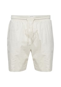 Beige cotton shorts with an elastic waistband and drawstring. Features side pockets and straight hem. Casual and lightweight design.