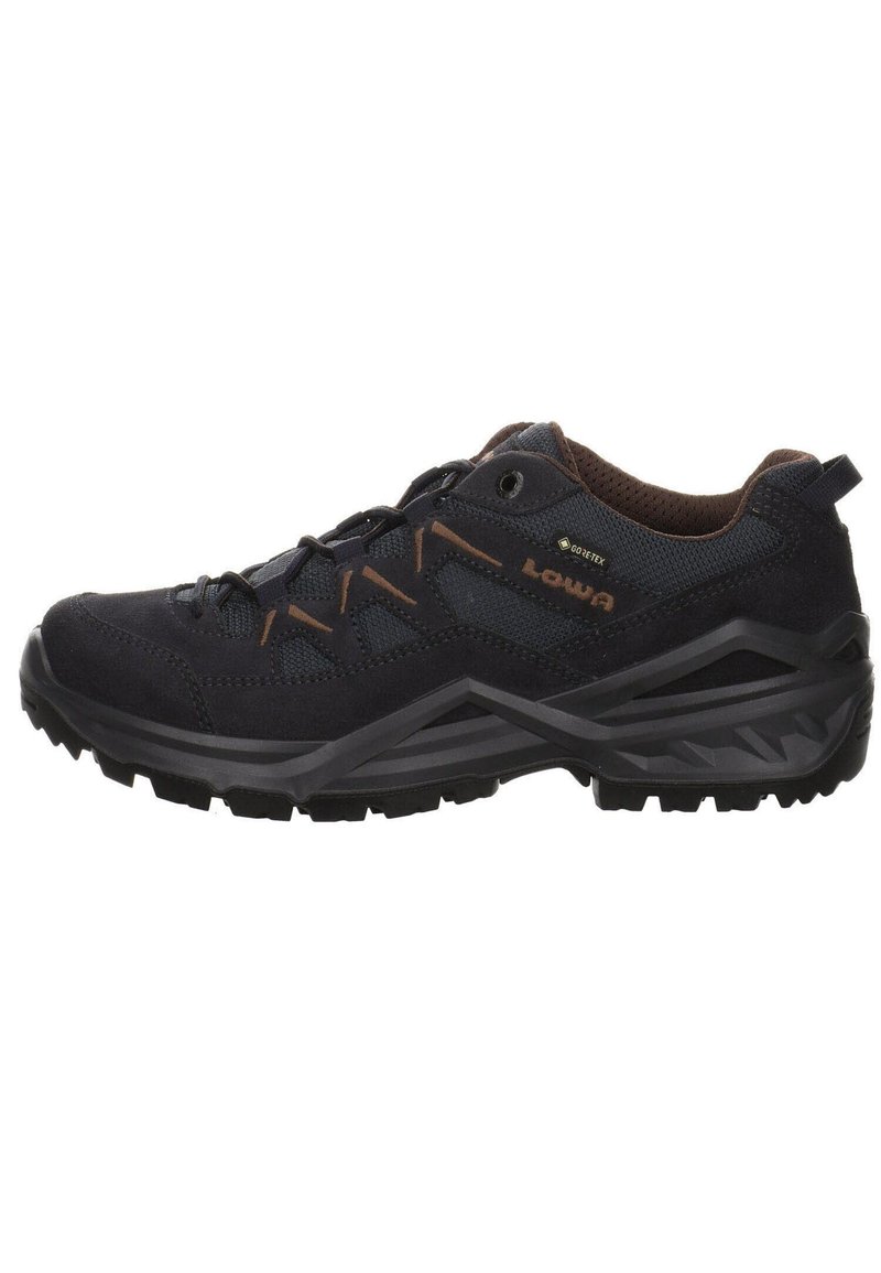 Dark navy hiking shoe with suede and mesh material. Features rubber sole, secure lacing, and brown accents. Designed for durability and traction.