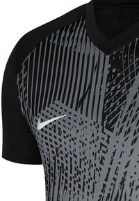 Zwart sportshirt met korte mouwen en een grijs geometrisch patroon, voorzien van een V-hals en een wit Nike-logo op de voorkant.