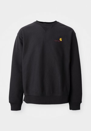 Black sweatshirt with a crew neck, long sleeves, and ribbed cuffs. Features a yellow and red logo on the left chest. Soft cotton material.