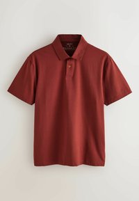 Vīriešu īsroku polo krekls ar brīvu piegriezumu, rūsas krāsā, ar vienu pogu un klasisku apkakli.