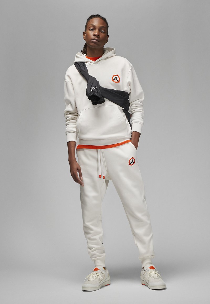 Jordan PANT Tracksuit bottoms phantom/rush orange/beige Zalando.co.uk