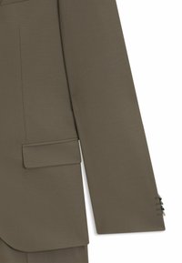 Olive green suit jacket featuring a smooth texture, single chest pocket, and three-button cuff detail. Tailored fit with a modern design.