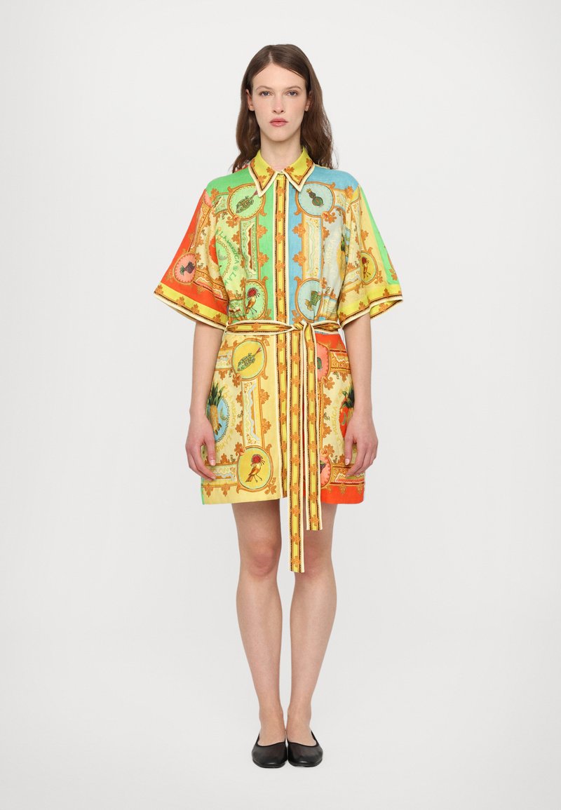 Short-sleeve shirt dress in vibrant colors with intricate patterns, a belted waist, and a collar. Made from lightweight, smooth fabric.