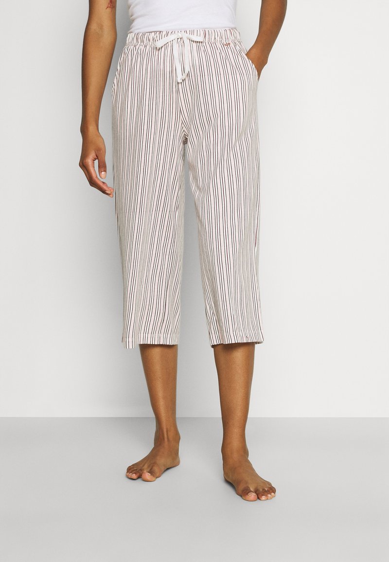 Striped cropped pants in light fabric, featuring a drawstring waist, side pockets, and vertical red and brown stripes on a beige background.