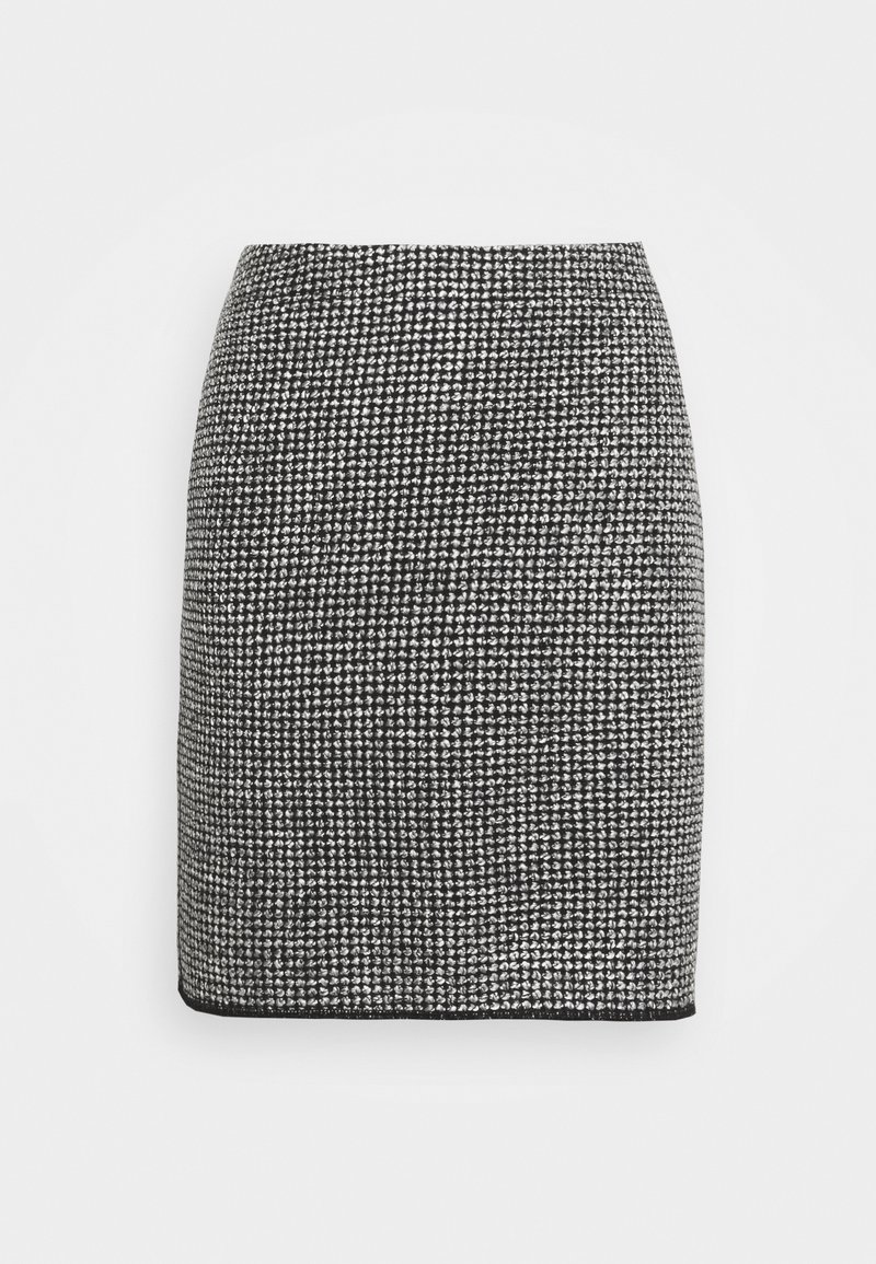 Jupe crayon en tweed noir et blanc avec une taille haute et un ourlet droit, présentée sur un fond blanc.