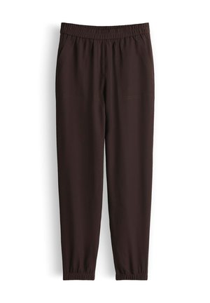 Dark brown elastic waist jogger pants with side pockets and elastic cuffs, displayed against a white background.