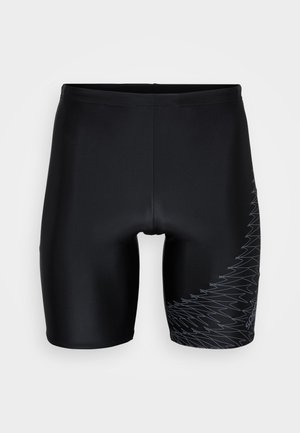 Mustad mustad ujumispüksid, millel on sile, matt tekstuur, vasakul küljel geometriline hõbedane muster ja elastne vöökohus.