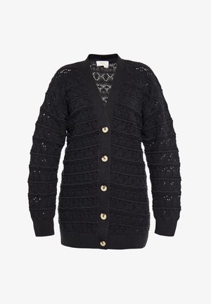 Black knitted cardigan featuring a textured pattern, v-neckline, long sleeves, and five round tan buttons down the front.