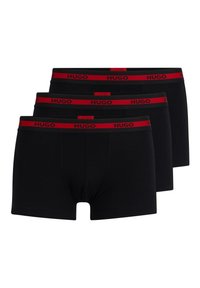 Schwarze Baumwollboxershorts mit einem roten HUGO-Logo-Bund, erhältlich im Dreierpack. Glatte Textur mit einer eng anliegenden Passform.
