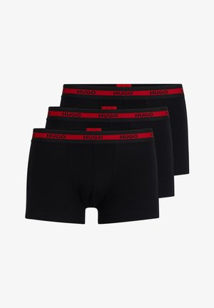 Black cotton boxers featuring a red HUGO branded waistband, available in a pack of three. Smooth texture with a snug fit design.
