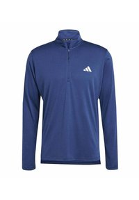 Marineblauwe lange mouwen sportieve half-zip top van een textuurstof met een klein wit Adidas-logo op de borst.