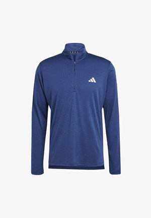 Marinblå långärmad idrottströja med halva dragkedjan, tillverkad av ett texturerat tyg, med en liten vit Adidas-logga på bröstet.