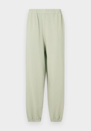 Light green, cotton blend jogger pants with an elastic waistband and cuffed ankles. Smooth texture and minimalistic design. No visible patterns.