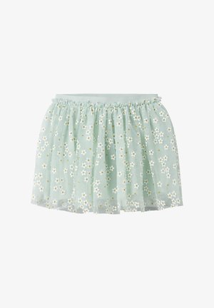 Jupe en tulle bleu clair avec une taille élastique, décorée de motifs de fleurs de pâquerettes blanches et jaunes.