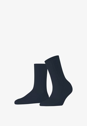 Marine ribbed katoenen sokken met een versterkte teen en een naadloze manchet; kenmerken een gladde textuur en een hoogte tot halverwege het kalf voor comfort.