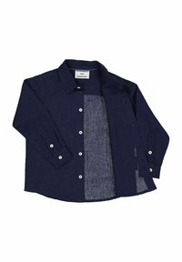 Laivastonsininen pellavapaita, pitkät hihat, nappikiinnitys, valkoiset napit, vaaleampi sisäkangas kontrastina, klassinen kaulus, kaareva helma.