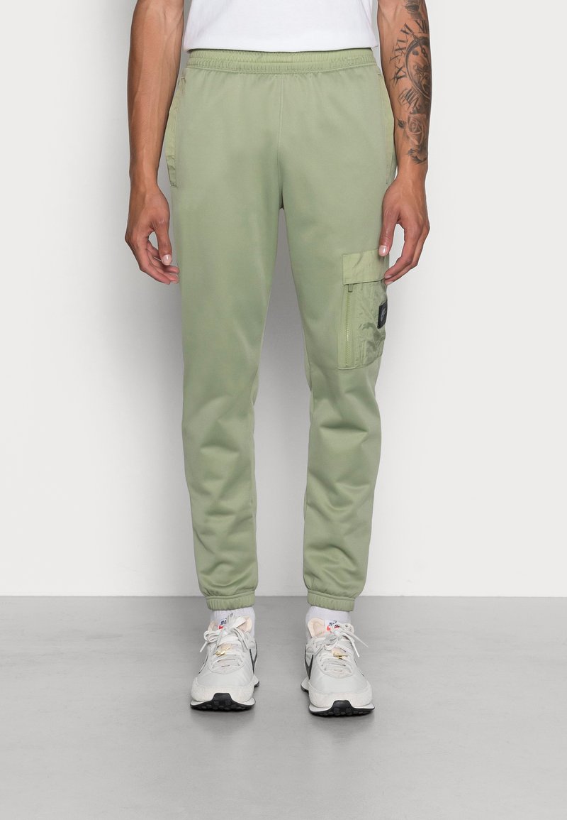 Nike Sportswear Tracksuit bottoms oil green/green Zalando.ie