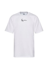 White cotton t-shirt with short sleeves. Features a black printed signature logo centered on the chest. Crew neck design.