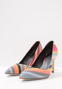 Pointed-toe high heels made of smooth, multicolored fabric featuring horizontal stripes in pink, gray, blue, and orange.