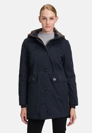 Marineblaue, kapuzenjacke mit Reißverschluss und Knopfleiste, vier Fronttaschen und einem kontrastierenden braunen Innenfutter.