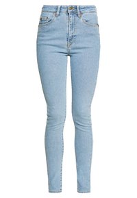 Vaqueros skinny de color azul claro, confeccionados en denim, con cintura alta, cinco bolsillos, pasadores para cinturón y sutiles detalles de costura.