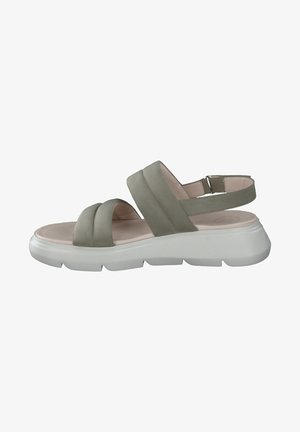 Light green leather sandal with two wide straps, a back strap, and a thick white platform sole. Smooth texture, minimalistic design.