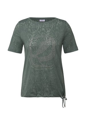 T-shirt vert à manches courtes avec motif de feuilles, doté d'un col rond, d'un ourlet à cordon sur le côté et d'un texte décoratif imprimé au centre.