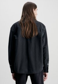 Calvin Klein Jeans RELAXED LINEAR - Camicia - ck black