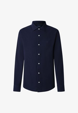 Námořnická modrá košile s dlouhým rukávem, knoflíkovým zapínáním a rozhozeným límcem, bílými knoflíky a jemně vyšitým logem na levé části hrudi.