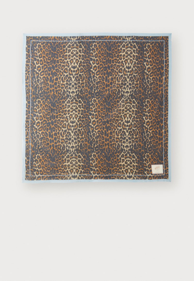 Leopard-print scarf featuring shades of brown and gold, with a light blue border and a small logo patch in the bottom corner.