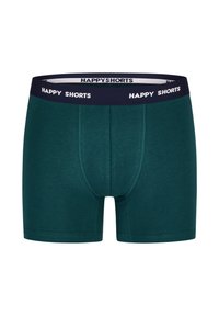 Donkergroene boxershorts met een marineblauwe elastische tailleband waarop "HAPPY SHORTS" in witte tekst staat. Zachte stof met een gladde textuur.