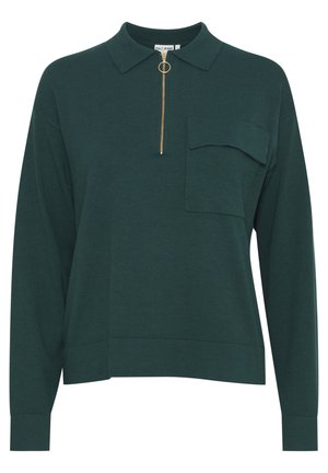 Donkergroene trui met een kraag, half rits met een gouden ring en een borstzak. Gemaakt van zachte stof, met lange mouwen en een relaxte pasvorm.