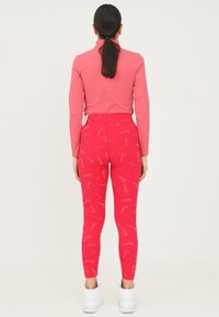 Nike Sportswear Legingi — bikses - very berry