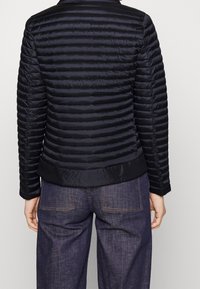 Save the duck Übergangsjacke - black