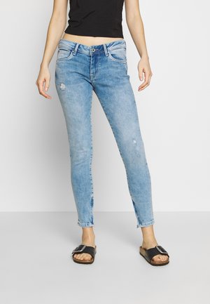 Vaqueros pitillo - bleached denim
