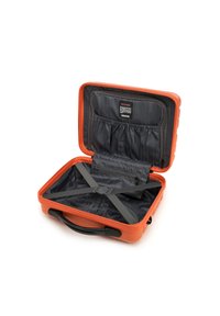 Orange hard-shell suitcase with a grey interior, featuring elastic straps, zippered pockets, and a branded label on the inner side.